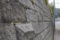 sloping stone wall, retaining masonry made of stone to reinforce the slopes of a mountain.