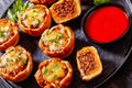 Sloppy joe cups on black plate, top view Royalty Free Stock Photo