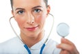 Sloseup portrait of woman doctor showing her stethoscope Royalty Free Stock Photo