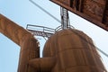 Sloss Furnaces National Historic Landmark, Birmingham Alabama USA, large riveted tank and pipe, open slat catwalks Royalty Free Stock Photo