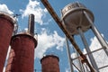 Sloss Furnaces National Historic Landmark, Birmingham Alabama USA, view looking up at water tower and furnaces against a blue sky Royalty Free Stock Photo