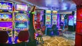 Slot machines in  casino onboard a cruise ship i Royalty Free Stock Photo