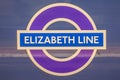 SLOUGH, ENGLAND- 11 September 2022: Elizabeth Line roundel on the side of a train