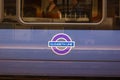 SLOUGH, ENGLAND- 11 September 2022: Elizabeth Line roundel on the side of a train