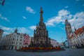 Sloup Nejsvetejsi trojice or Holy trinity sculpture on a town square in Olomouc, Czech republic on a sunny day with some clouds.