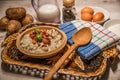 Slovak traditional dishes potato gnocchi with sheep`s cheese, on a wooden table laid on the table Royalty Free Stock Photo