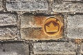 Slovakia, Bratislava. Brass crown marker in cobblestone streets