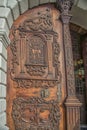 Slovakia, Bratislava - November 5th, 2017 historic old town, buildings from austro-hungarian empire. Entrance wooden door to churc Royalty Free Stock Photo