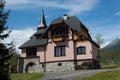 SLOVAKIA, TATRANSKA LOMNICA - MAY 05, 2014: Stone house with wooden elements in Tatranska Lomnica.