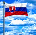 Slovakia waving flag against blue sky