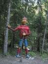 Slovakia, Western Tatra mountain, July 3, 2019: big colorful wooden statue wood carving of hiker at beginning of Uzka