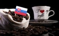 Slovakian flag in a bag with coffee beans on black