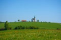 Slovenian countryside in spring with charming little church on a hill, in Slovenia Royalty Free Stock Photo