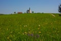 Slovenian countryside in spring with charming little church on a hill, in Slovenia. Selective focus Royalty Free Stock Photo