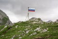 Slovenian flag in alpian mountains Royalty Free Stock Photo