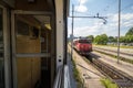 Slovenian Railways Slovenske Zeleznice electric locomotive Series 363 seen from window of 2nd class compartment of passenger