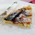 Slovenian traditional food, cheese cake, on a plate, fork, close up