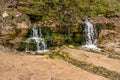 Slovenian water sources. the spring flows out of the ground. Izborsk, Pskov Oblast