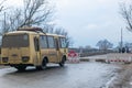 Sloviansk, Ukraine - March 25 2021: Passengers transit through the broken bridge at Svobody street