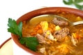 Slow cooked cabbage is the base of the traditional Russian shchi spoon in bowl