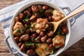 Slow cooked chicken with broad beans close up in a bowl. horizon Royalty Free Stock Photo