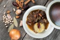 Slow cooked lamb with potato and dates served with warm couscous and chickpeas