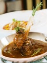 Slow Cooked Lamb shank braised in an onion jus