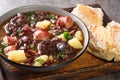 Slow Cooked Portuguese Stone Soup or Sopa da Pedra closeup in the plate. Horizontal