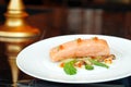 Slow Cooked Salmon fillet steak with salad and roe salmon on white plate Royalty Free Stock Photo