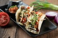 Slow cooked short ribs on tortillas with a spring onion tomato salsa Royalty Free Stock Photo