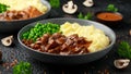 Slow Cooked Steak Diane Casserole with mushroom. mashed potatoes and green peas Royalty Free Stock Photo
