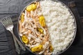 Slow Cooker Mississippi Chicken with ranch seasoning, dried au jus gravy mix and pepperoncini peppers served with rice closeup on Royalty Free Stock Photo