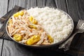 Slow Cooker Mississippi Chicken with ranch seasoning, dried au jus gravy mix and pepperoncini peppers served with rice closeup on Royalty Free Stock Photo