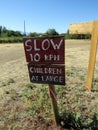 Slow down. Children at large sign. Royalty Free Stock Photo