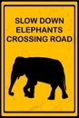 Slow Down Elephants Crossing Road sign Royalty Free Stock Photo