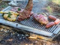 slow grilling chorizo sausages , chicken quarters, skirt and flank muscle steaks argentinian cuts Royalty Free Stock Photo