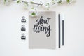 Slow living, calligraphic background with spring branch