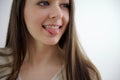 Slow motion close up portrait of an adult woman,smiling presenting with her optimistic,carefree ,vibrant attitude and