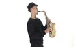 Slow motion. Saxophonist plays a tune on the sax