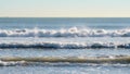 sea view waves roll over the sandy shore