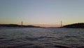 Slow-motion shot: Istanbul's iconic bridge at sunset.
