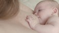 Slow motion video of baby breastfeeding