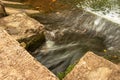 slow motion of water sliding from a small dam Royalty Free Stock Photo
