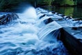 slow shutter speed hydroelectric turbines capture the flowing mo