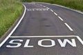 Slow signs on the road Royalty Free Stock Photo