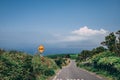 Slow warning sign down a steep rural countryside in county Kerry Royalty Free Stock Photo