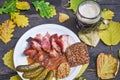 Slowly roasted smoked pork knuckle with mug of dark beer. Royalty Free Stock Photo