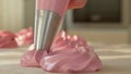 Slowmotion. From appetizing pastry bag out pastry cream or pink.