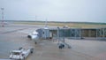 Aircraft boarding through the airbridge.