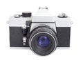 SLR camera on film 35mm format with lens isolated on a white background